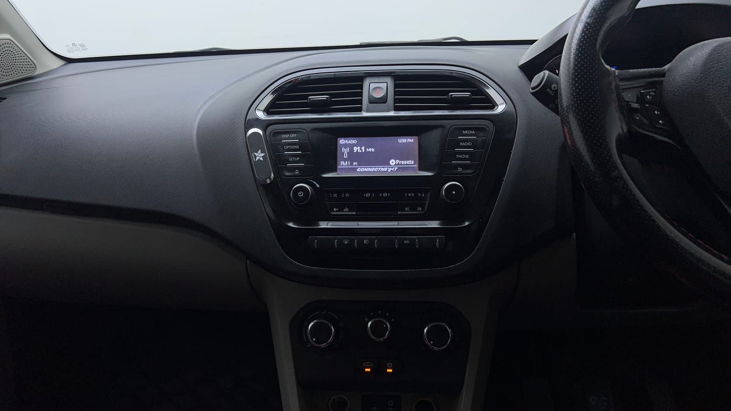 Used 2018 Tata Tiago XZ CNG (Outside Fitted) Cng Manual top_features Integrated (in-dash) music system