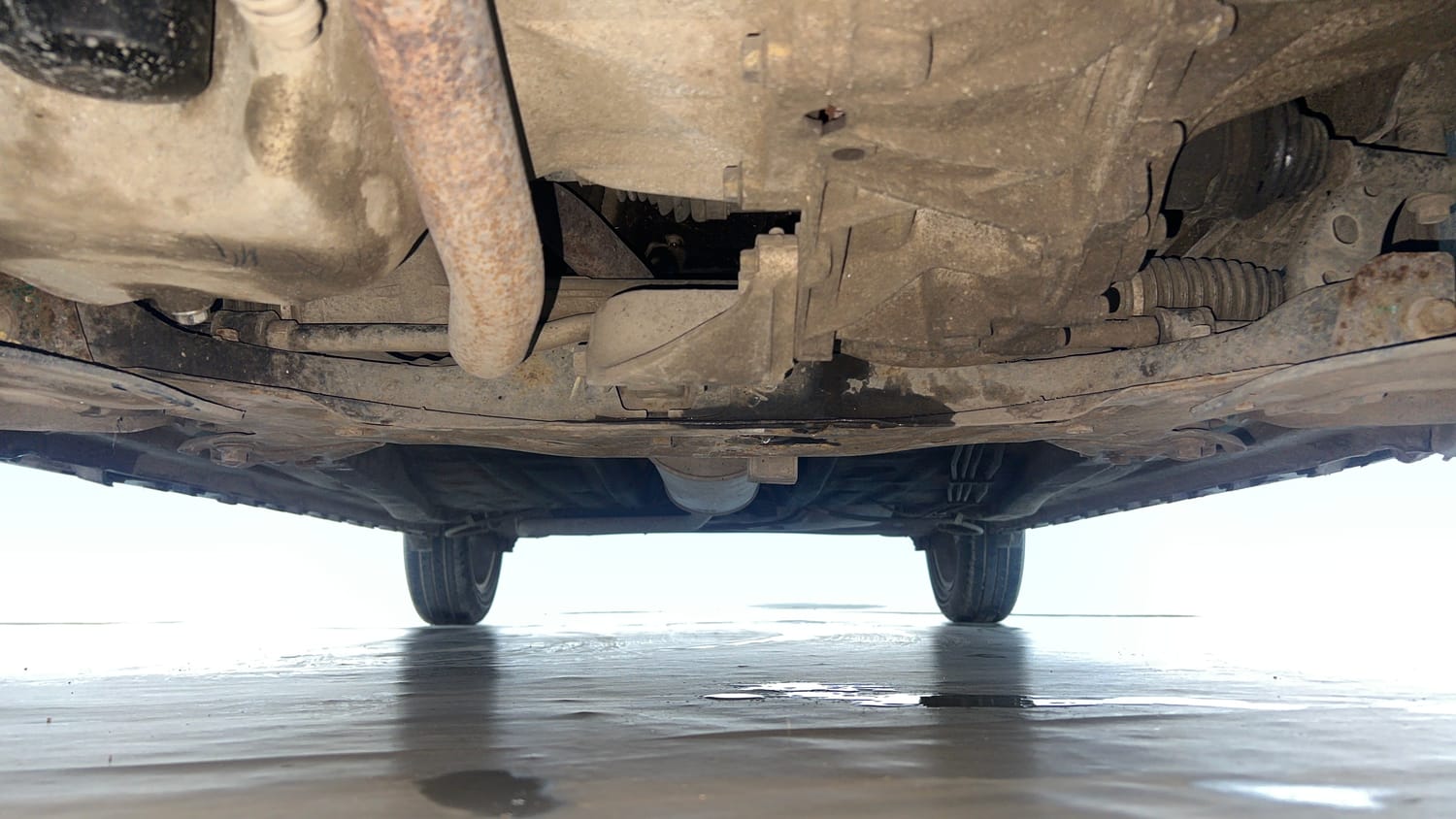 Used 2021 Maruti Suzuki Ignis Zeta 1.2 AMT Petrol Automatic extra FRONT LEFT UNDERBODY VIEW