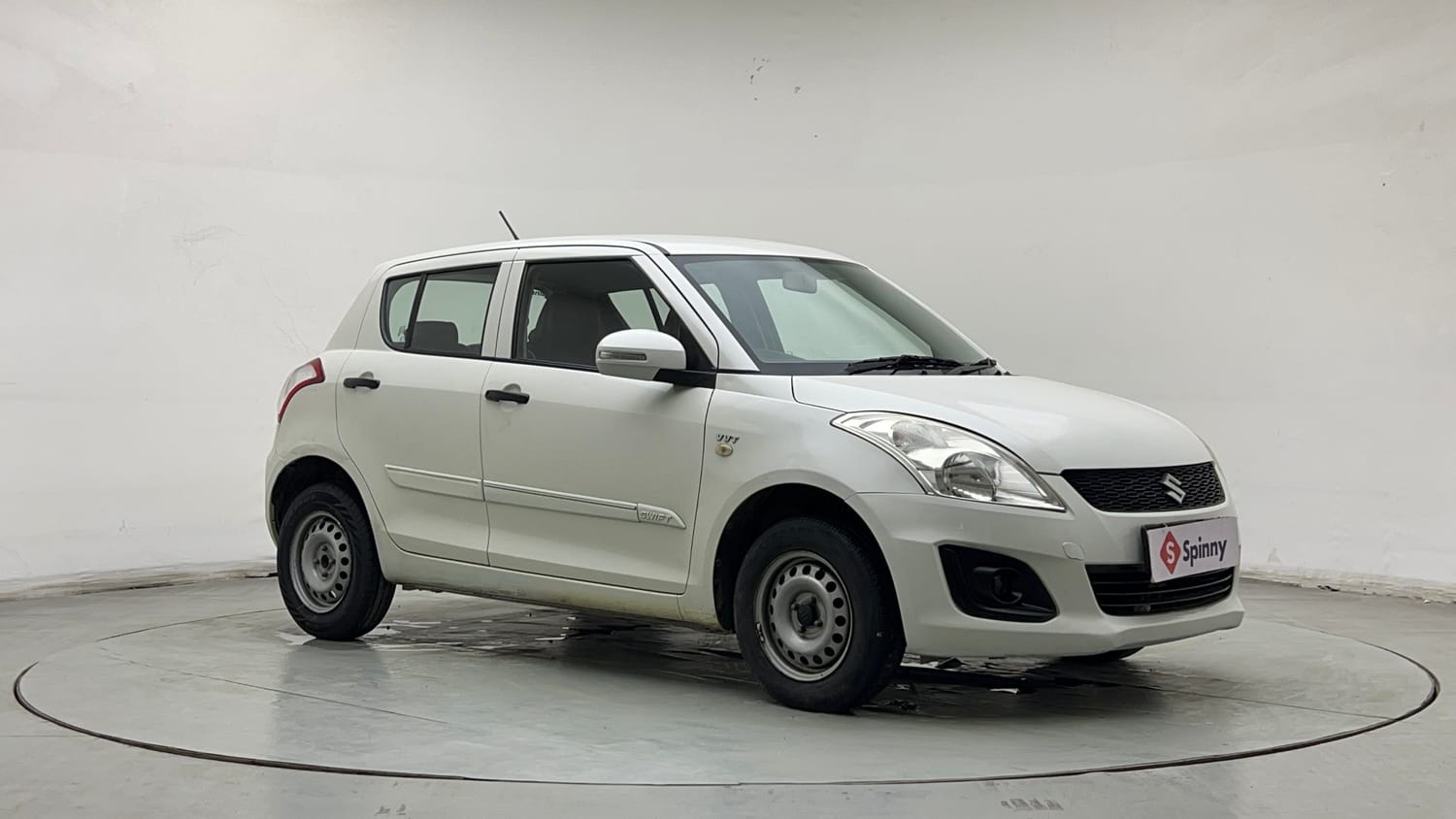 Used 2015 Maruti Suzuki Swift Lxi (O) Petrol Manual exterior RIGHT FRONT CORNER VIEW