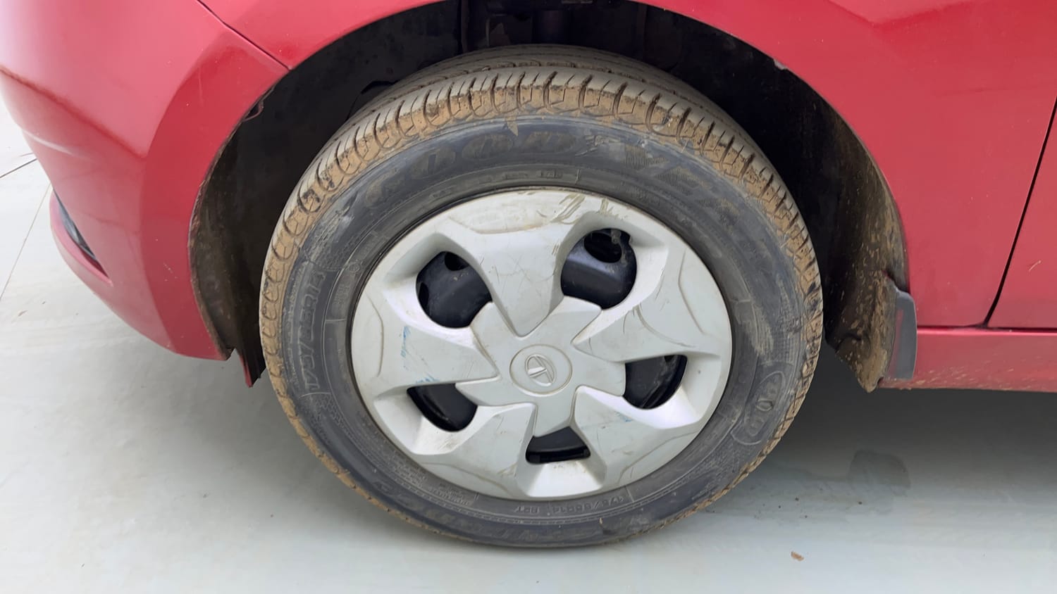 Used 2018 Tata Tiago Revotron XT Petrol Manual tyres LEFT FRONT TYRE RIM VIEW