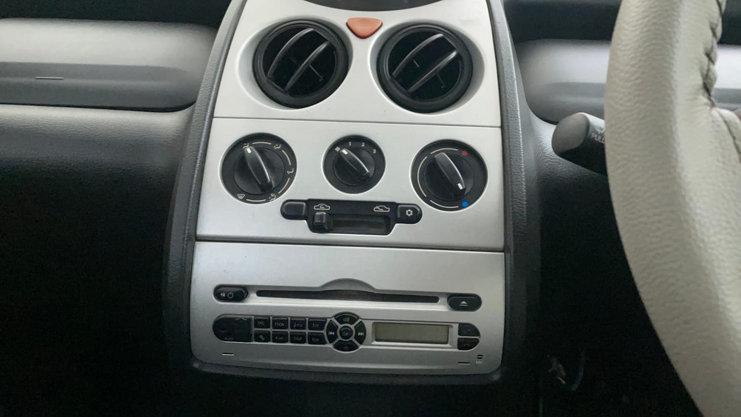 Used 2014 Tata Nano LX Petrol Manual top_features Integrated (in-dash) music system