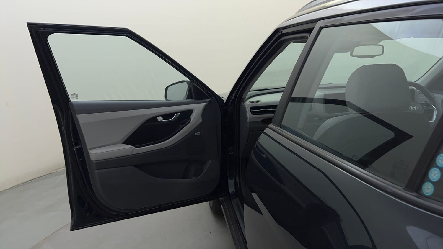 Used 2024 Hyundai Creta 1.5 Turbo Petrol DCT SX(O) Petrol Automatic interior LEFT FRONT DOOR OPEN VIEW
