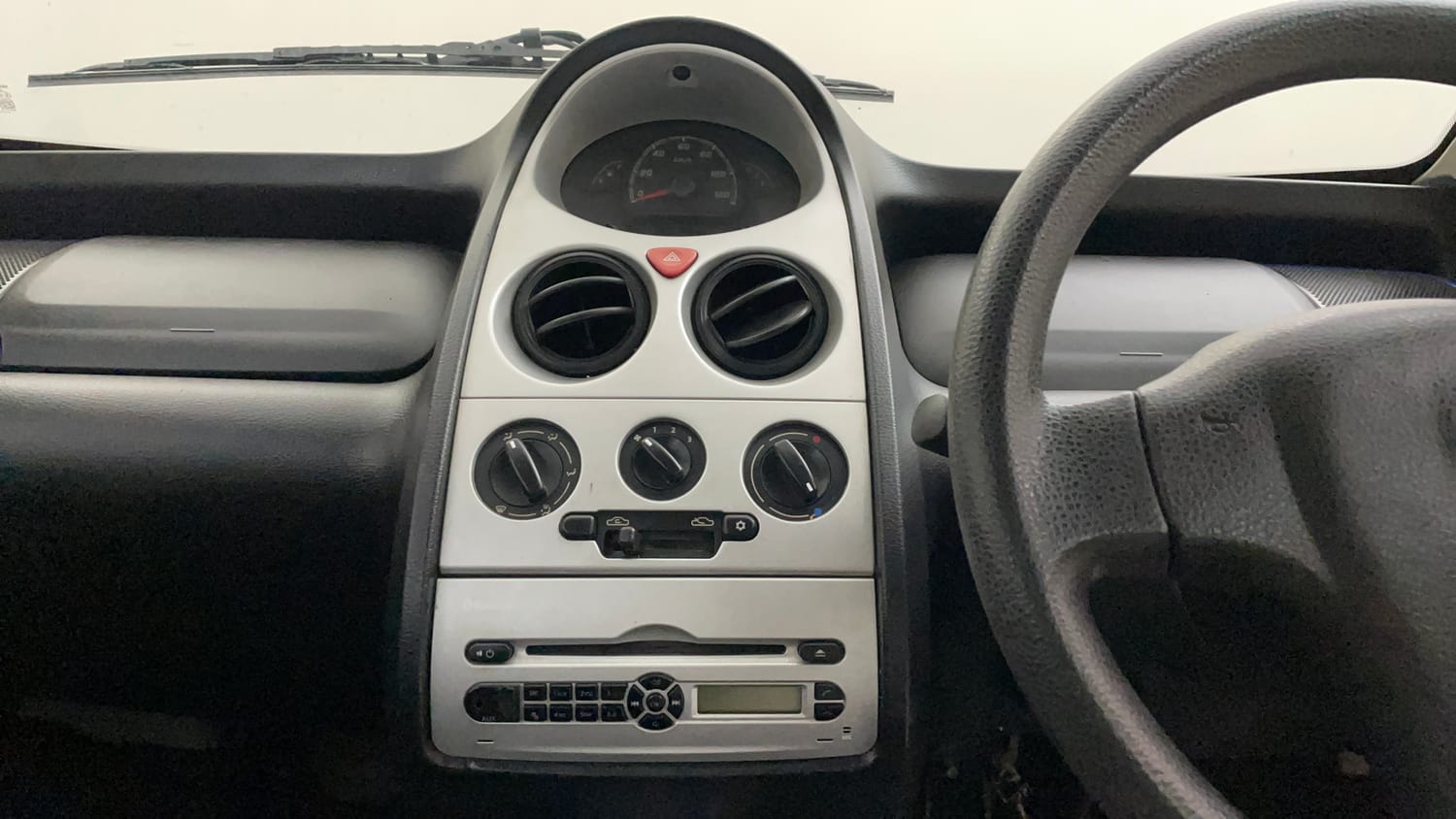Used 2015 Tata Nano Twist XT Petrol Manual interior MUSIC SYSTEM & AC CONTROL VIEW