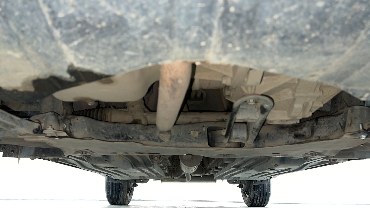 Used 2023 Maruti Suzuki Brezza VXi Petrol Manual extra FRONT LEFT UNDERBODY VIEW