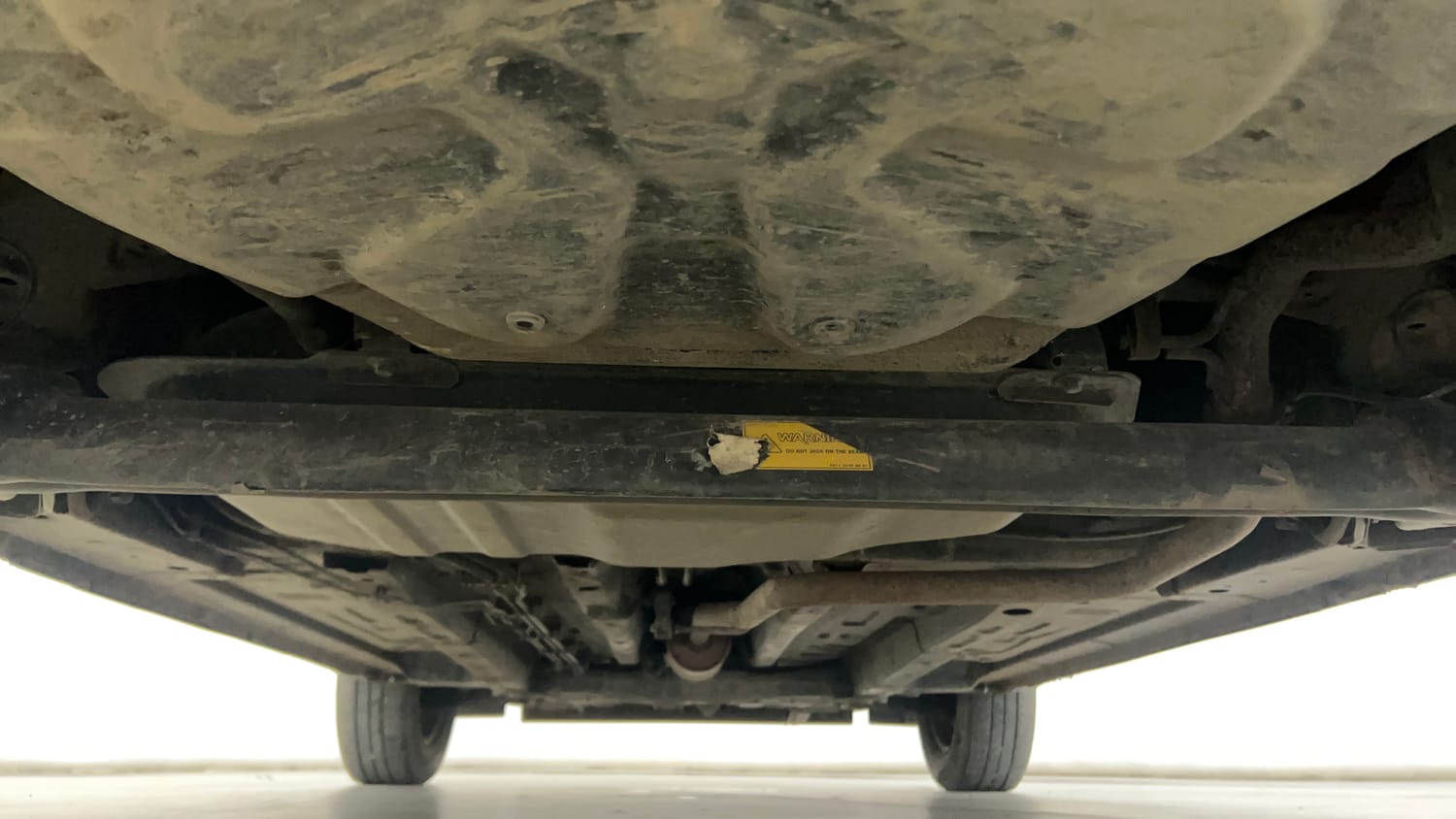 Used 2022 Tata Punch Adventure Rhythm Pack MT Petrol Manual extra REAR UNDERBODY VIEW (TAKEN FROM REAR)