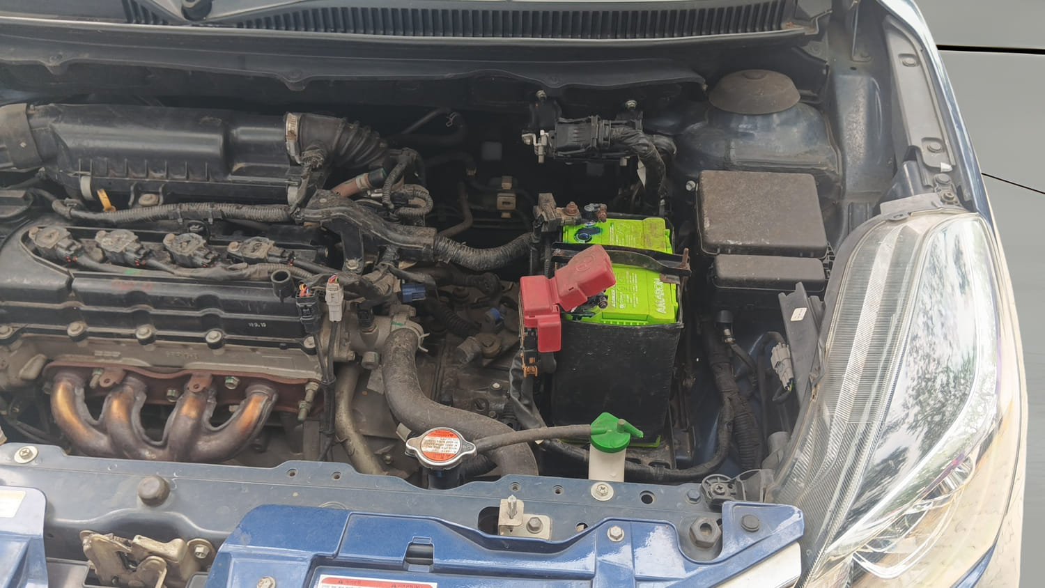 Used 2019 Maruti Suzuki Baleno Delta Petrol Manual engine ENGINE LEFT SIDE VIEW
