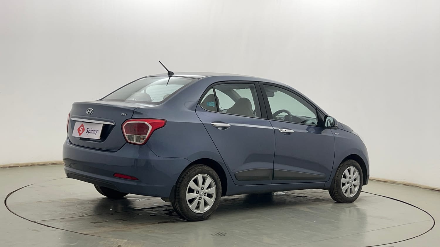 Used 2014 Hyundai Xcent SX 1.2 Petrol Manual exterior RIGHT REAR CORNER VIEW