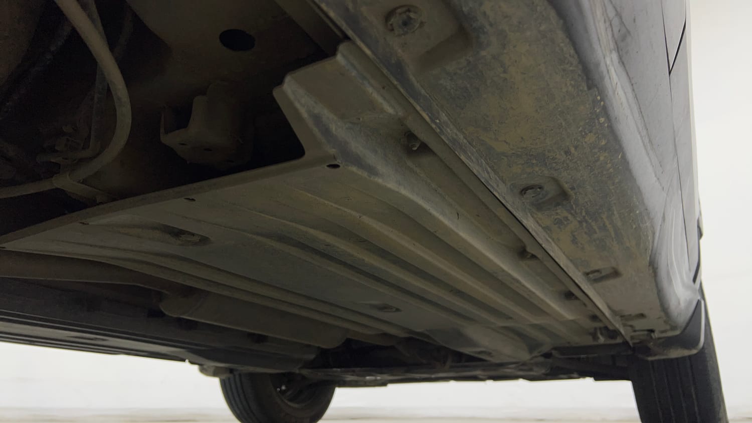 Used 2023 Maruti Suzuki Brezza VXi Petrol Manual extra REAR RIGHT UNDERBODY VIEW
