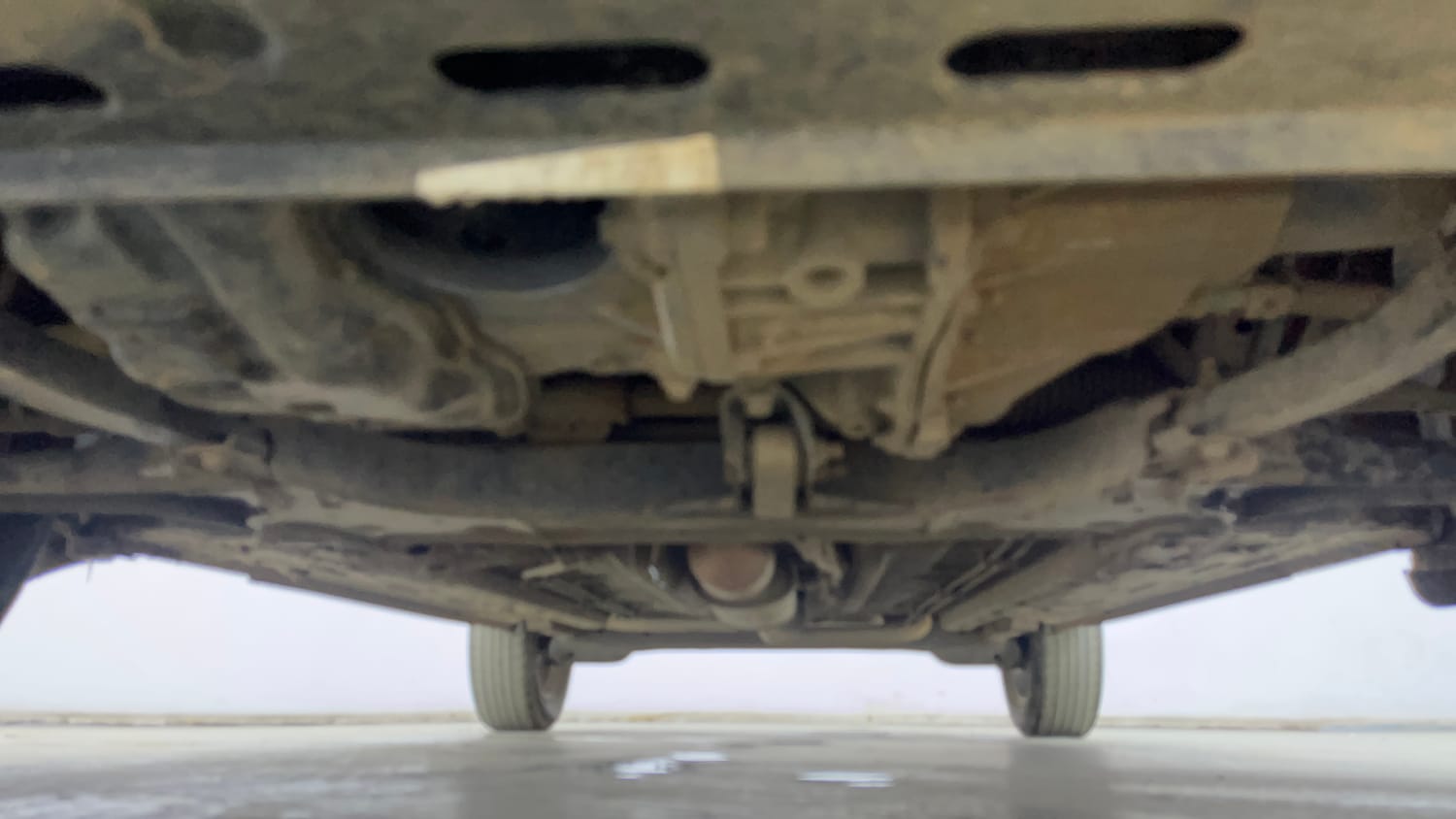Used 2023 Nissan Magnite XV Premium Turbo Petrol Manual extra FRONT LEFT UNDERBODY VIEW