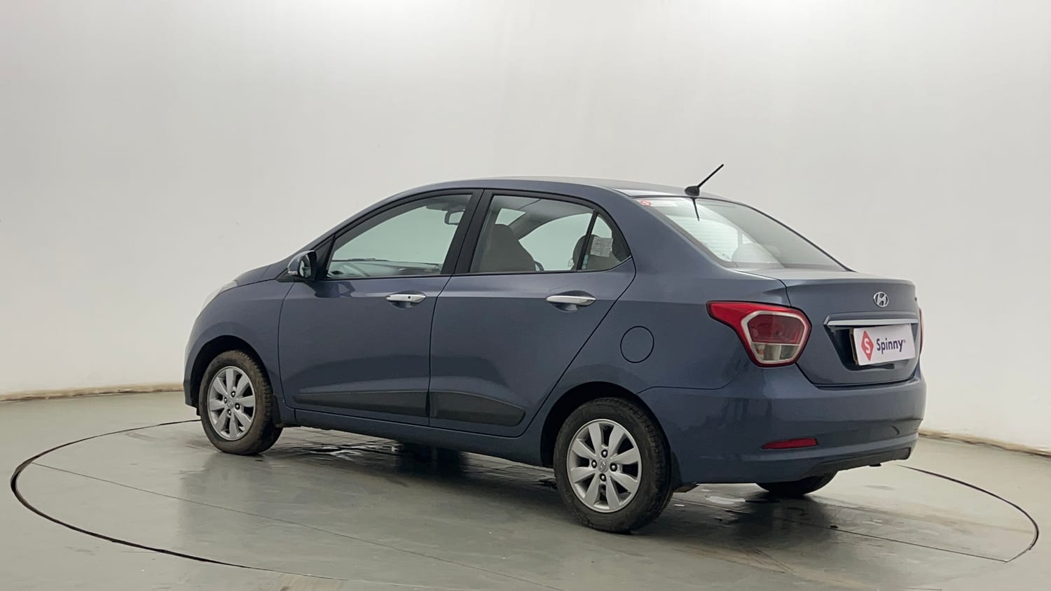 Used 2014 Hyundai Xcent SX 1.2 Petrol Manual exterior LEFT REAR CORNER VIEW