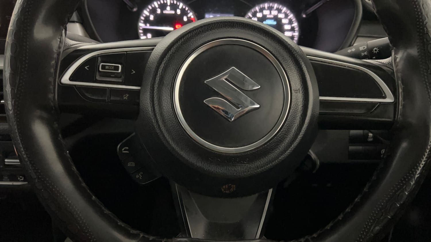 Used 2023 Maruti Suzuki Brezza VXi Petrol Manual top_features Steering mounted controls