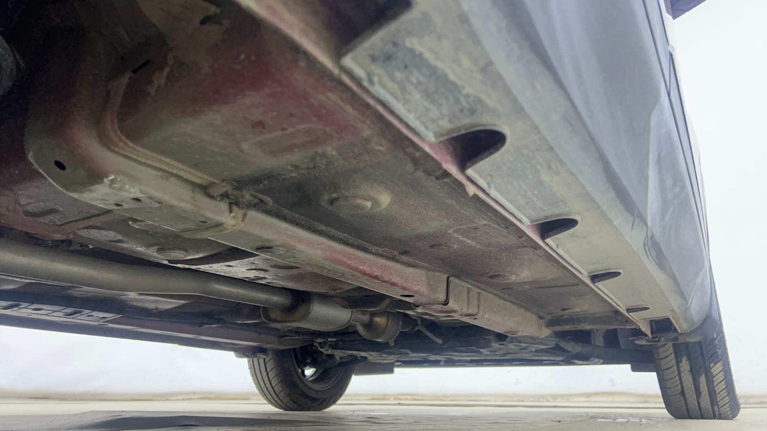 Used 2024 Hyundai Exter SX (O) Connect 1.2 AMT Petrol Automatic extra REAR RIGHT UNDERBODY VIEW