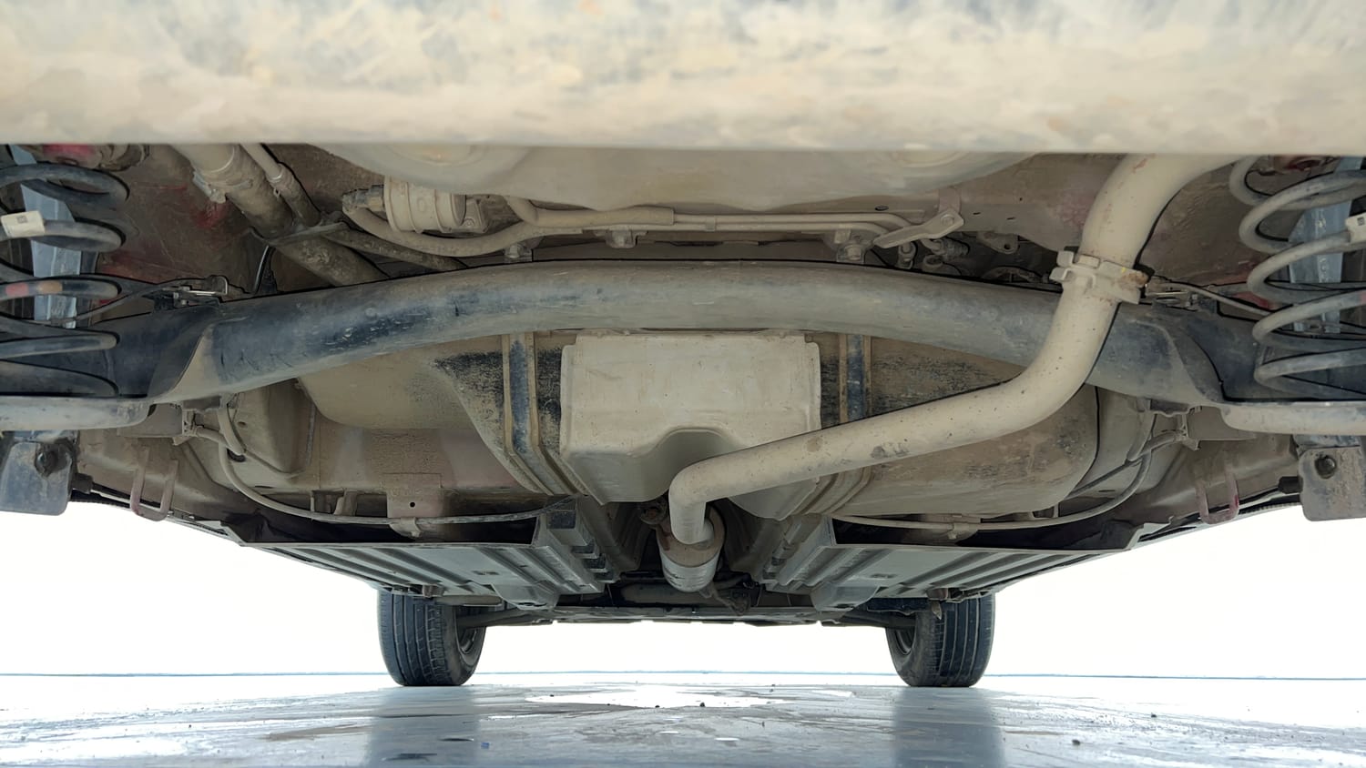 Used 2023 Maruti Suzuki Brezza VXi Petrol Manual extra REAR UNDERBODY VIEW (TAKEN FROM REAR)