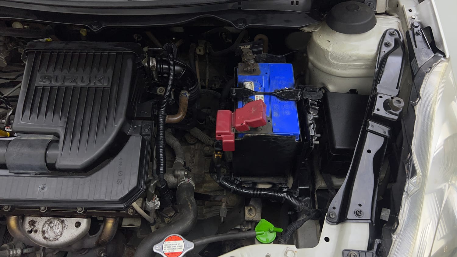 Used 2015 Maruti Suzuki Swift Lxi (O) Petrol Manual engine ENGINE LEFT SIDE VIEW