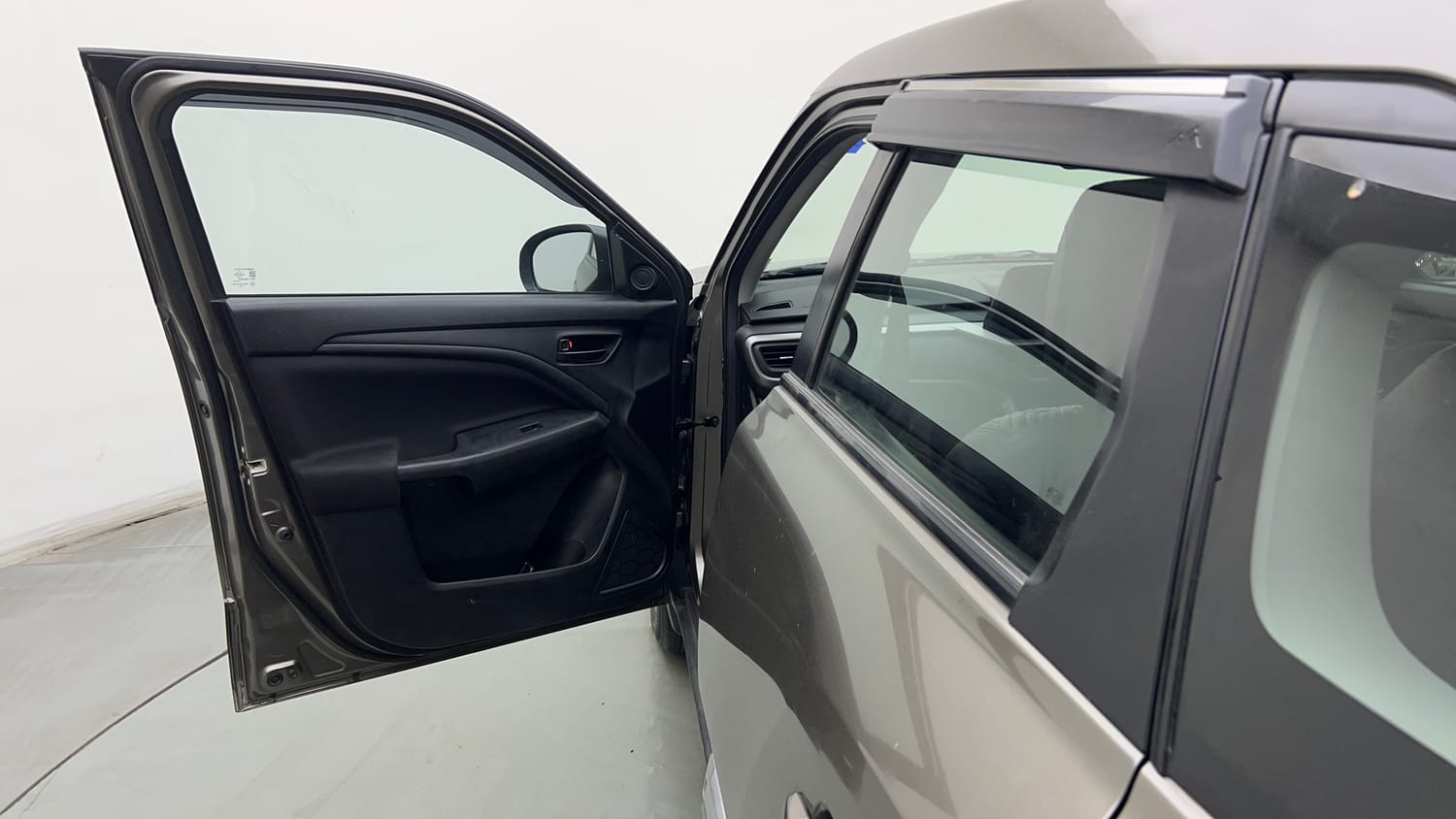 Used 2023 Maruti Suzuki Brezza VXi Petrol Manual interior LEFT FRONT DOOR OPEN VIEW