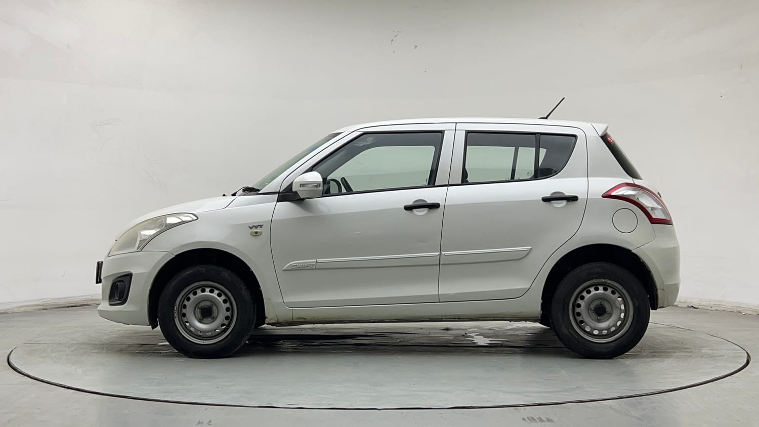 Used 2015 Maruti Suzuki Swift Lxi (O) Petrol Manual exterior LEFT SIDE VIEW