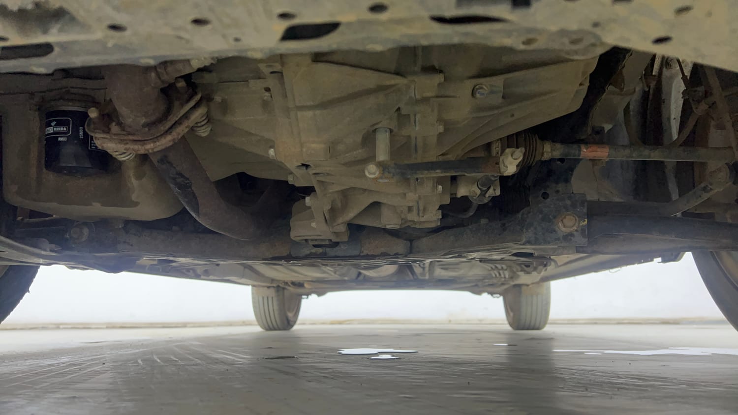 Used 2021 Maruti Suzuki Baleno Zeta Petrol Manual extra FRONT LEFT UNDERBODY VIEW