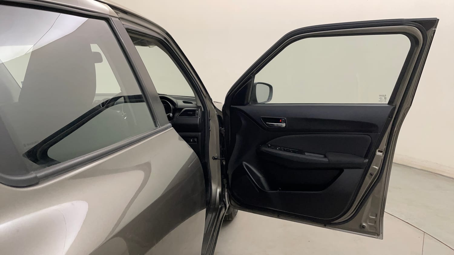 Used 2023 Maruti Suzuki Swift VXi Petrol Manual interior RIGHT FRONT DOOR OPEN VIEW