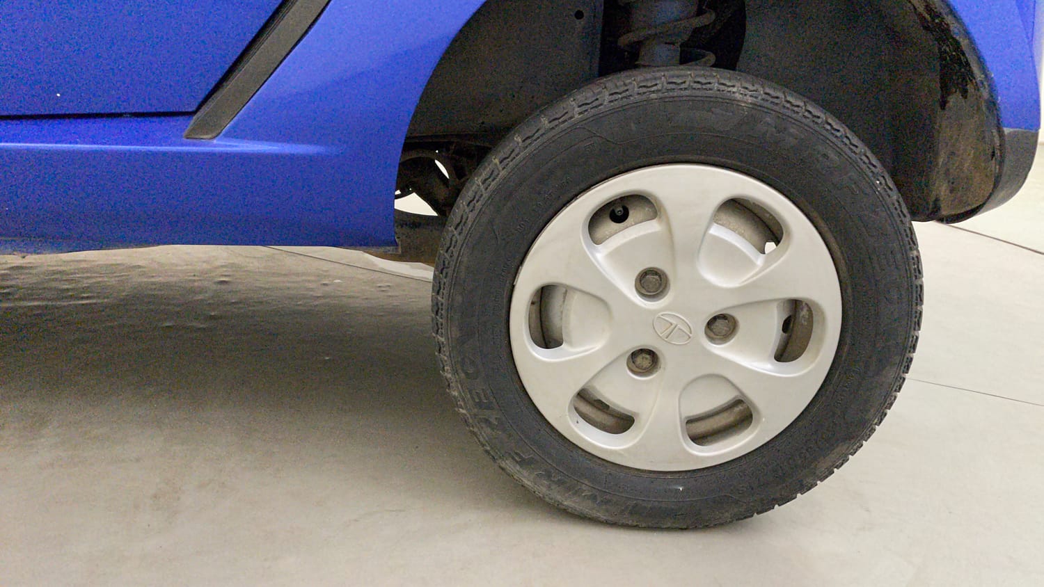Used 2015 Tata Nano Twist XT Petrol Manual tyres LEFT REAR TYRE RIM VIEW