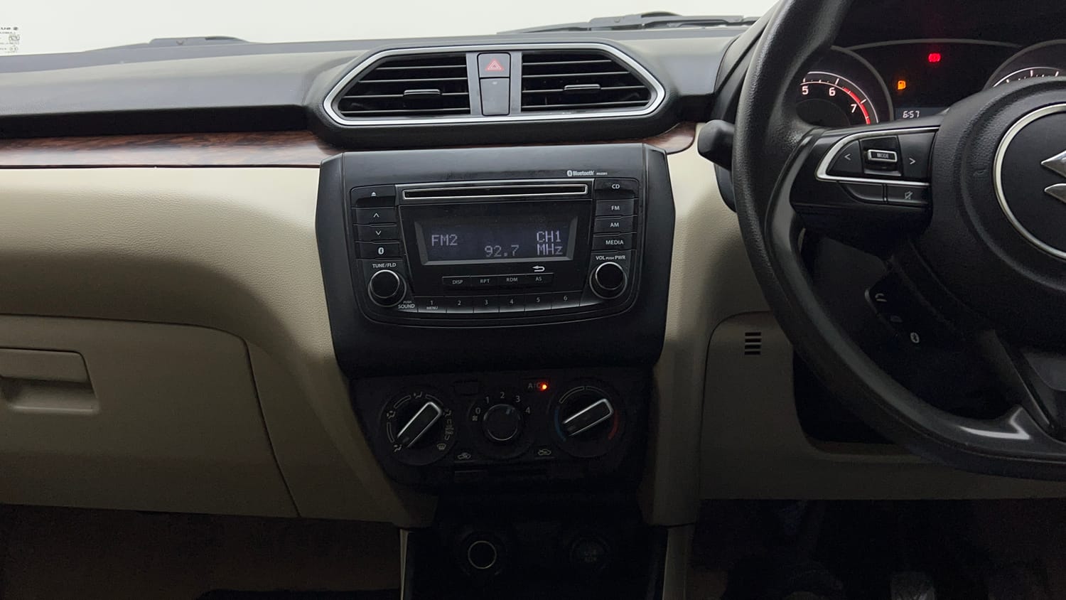 Used 2019 Maruti Suzuki Dzire VXi Petrol Manual interior MUSIC SYSTEM & AC CONTROL VIEW