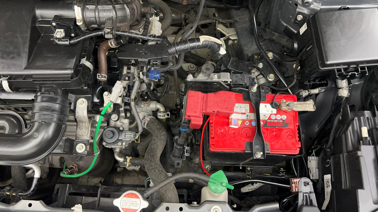 Used 2023 Maruti Suzuki Brezza ZXi Petrol Manual engine ENGINE LEFT SIDE VIEW