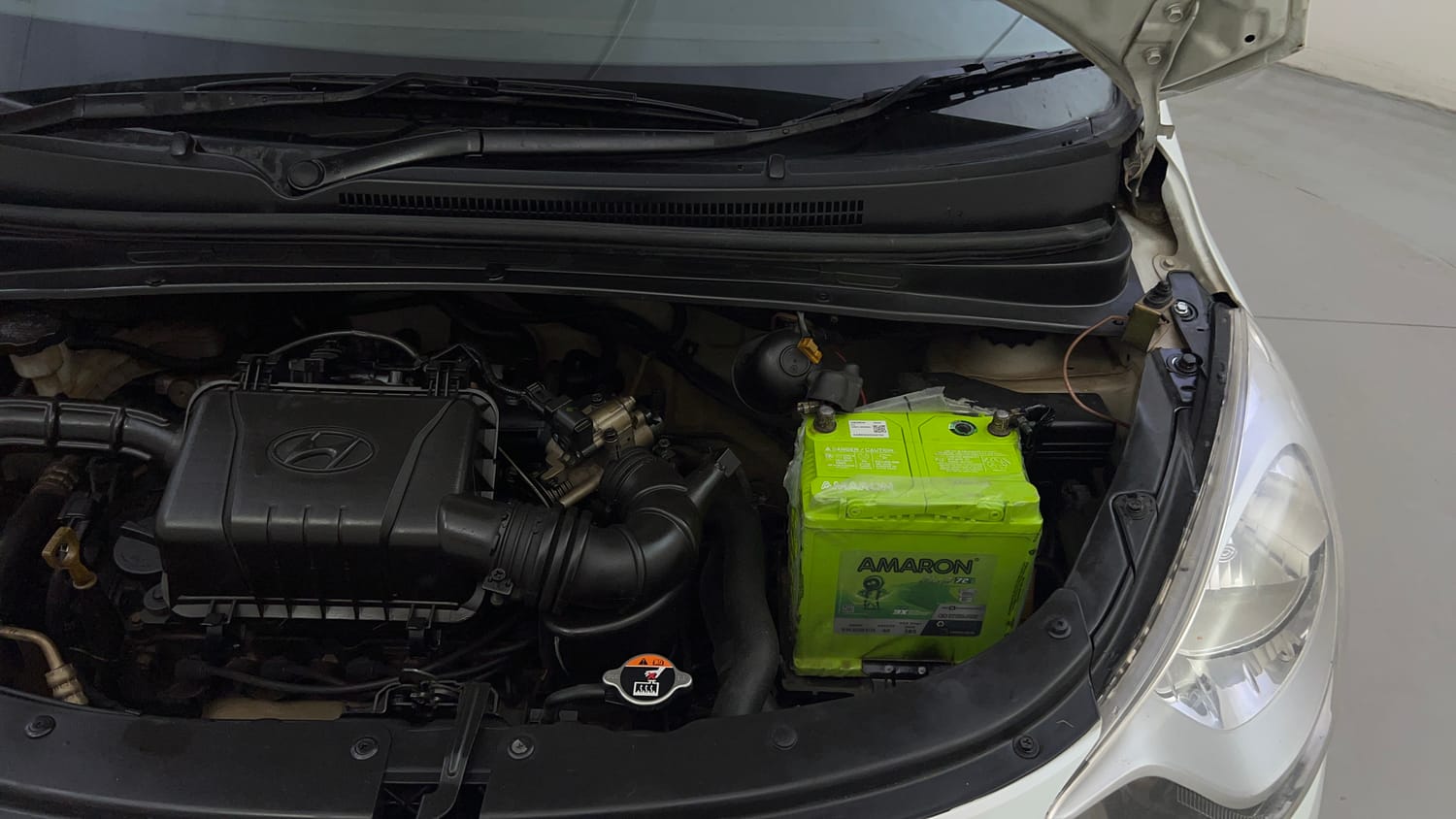 Used 2012 Hyundai i10 Magna 1.1 iRDE2 Petrol Manual engine ENGINE LEFT SIDE HINGE & APRON VIEW