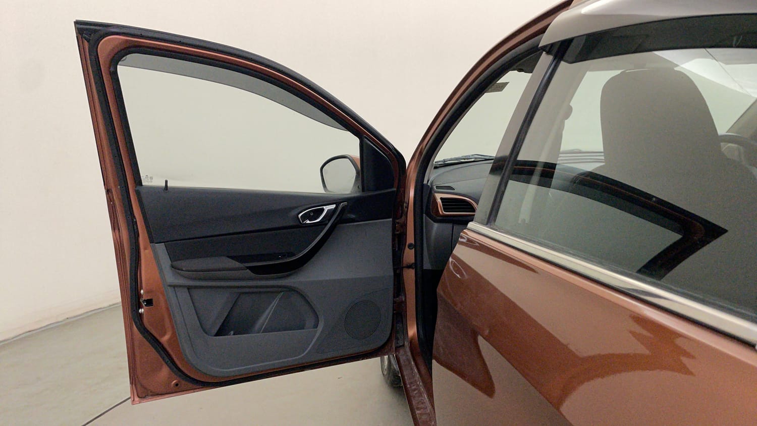Used 2017 Tata Tigor Revotorq XZ (O) Diesel Manual interior LEFT FRONT DOOR OPEN VIEW