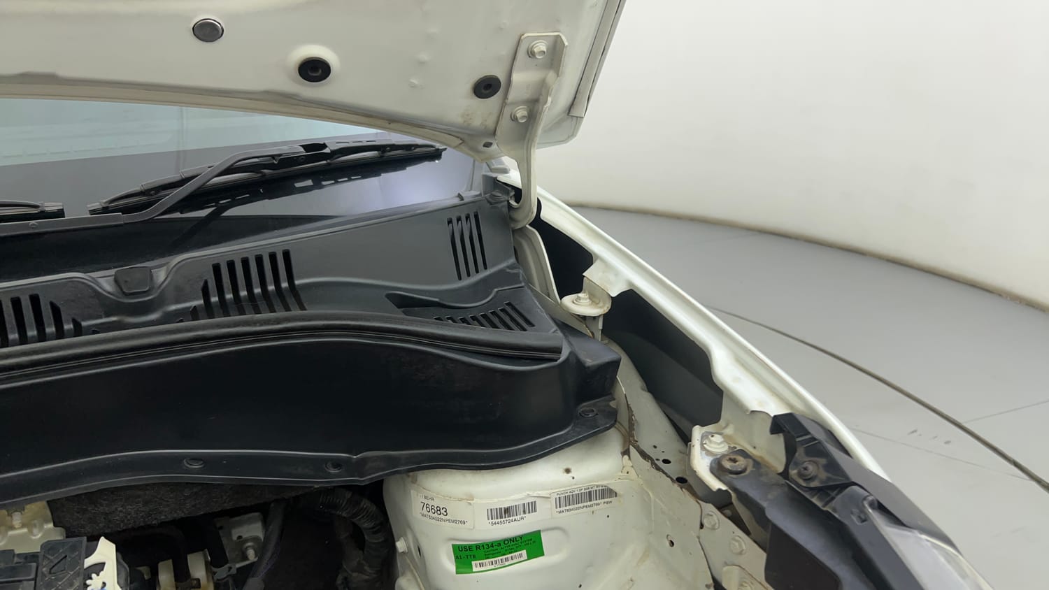Used 2022 Tata Punch Adventure Rhythm Pack MT Petrol Manual engine ENGINE LEFT SIDE HINGE & APRON VIEW