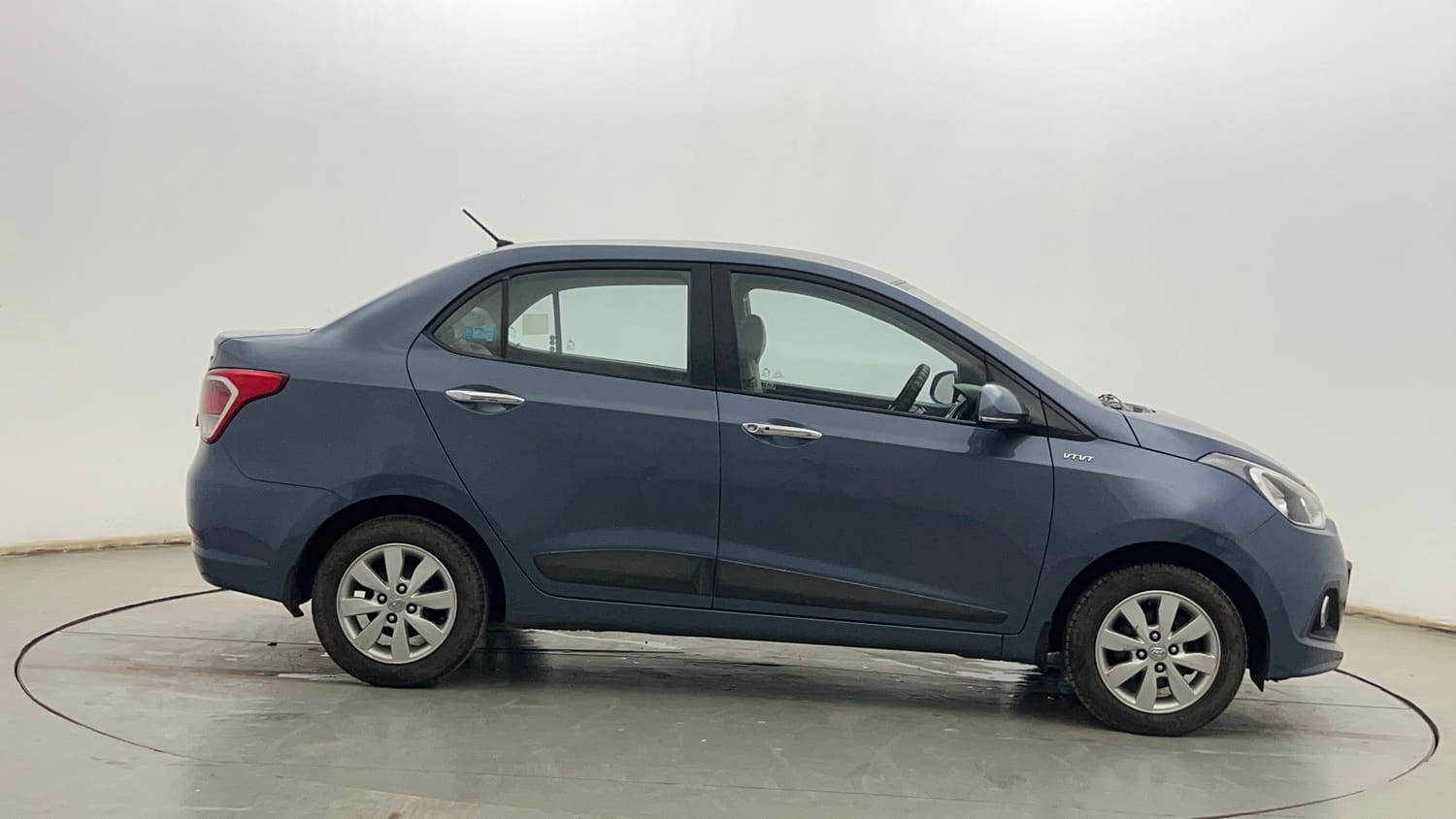 Used 2014 Hyundai Xcent SX 1.2 Petrol Manual exterior RIGHT SIDE VIEW