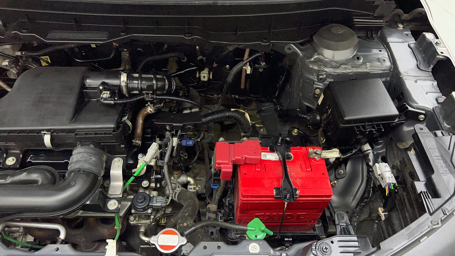 Used 2023 Maruti Suzuki Brezza VXi Petrol Manual engine ENGINE LEFT SIDE VIEW