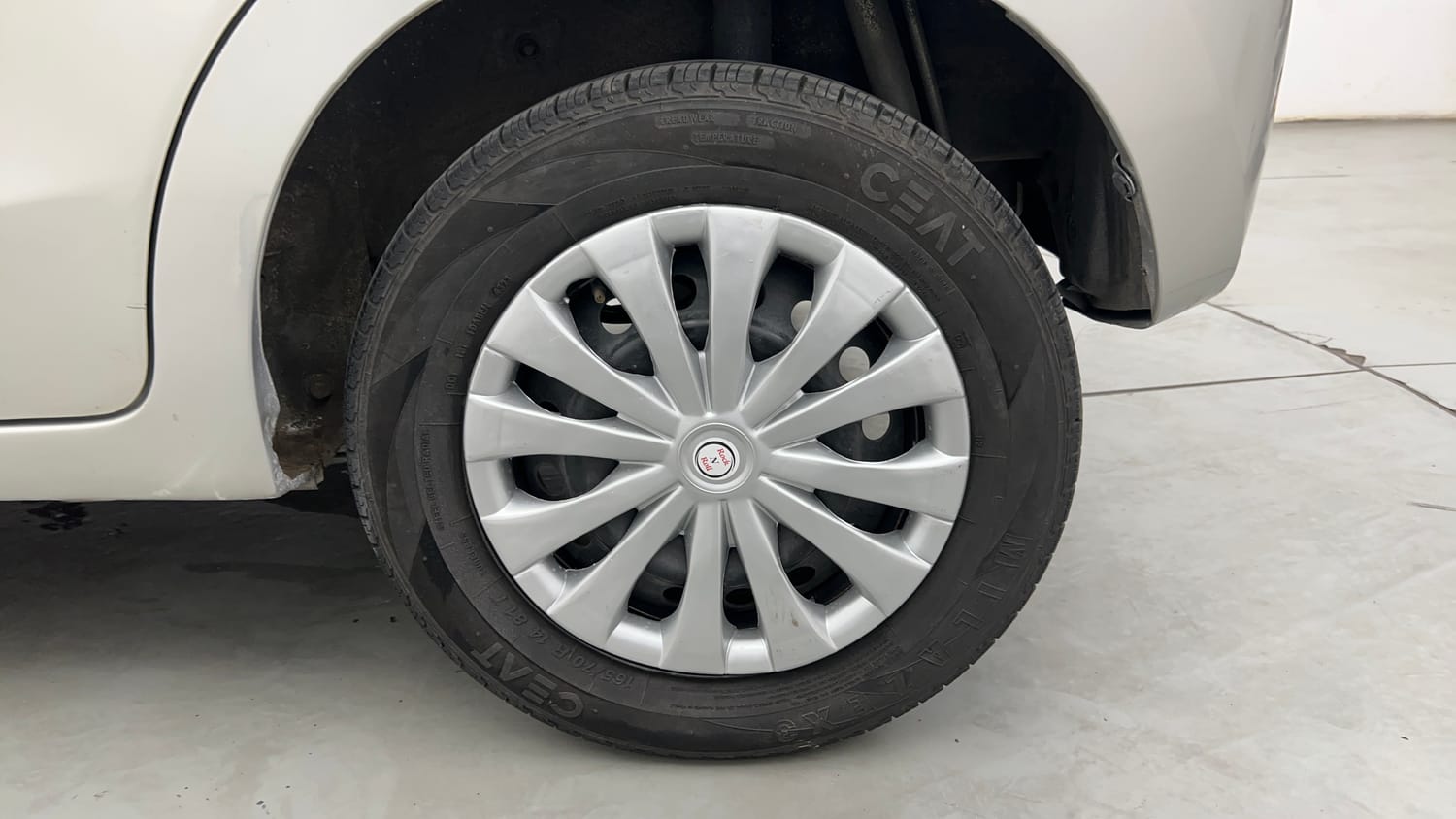 Used 2015 Maruti Suzuki Celerio VXi Petrol Manual tyres LEFT REAR TYRE RIM VIEW