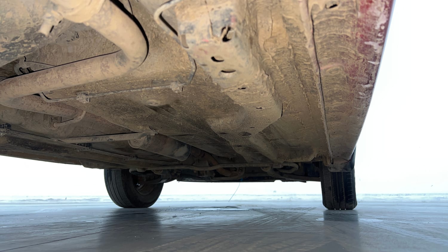 Used 2019 Tata Tiago Revotron XZ w/o Alloy Petrol Manual extra REAR RIGHT UNDERBODY VIEW
