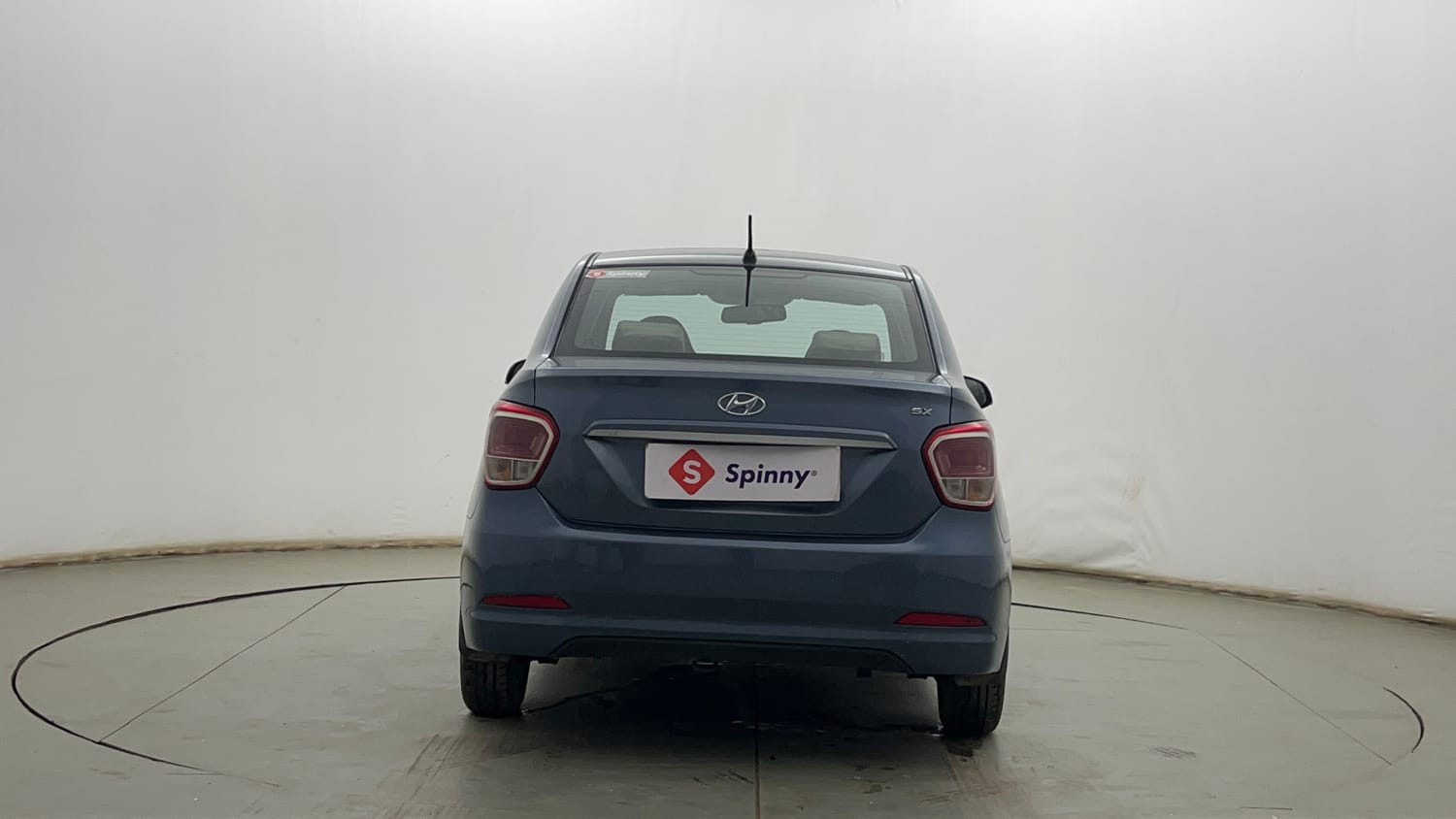Used 2014 Hyundai Xcent SX 1.2 Petrol Manual exterior BACK VIEW