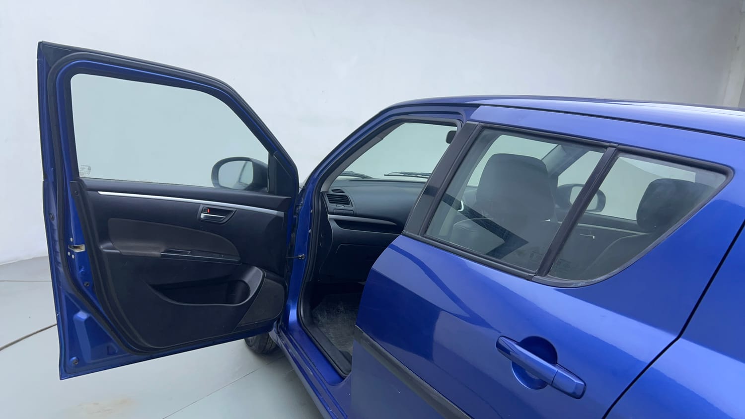 Used 2012 Maruti Suzuki Swift VXi Petrol Manual interior LEFT FRONT DOOR OPEN VIEW