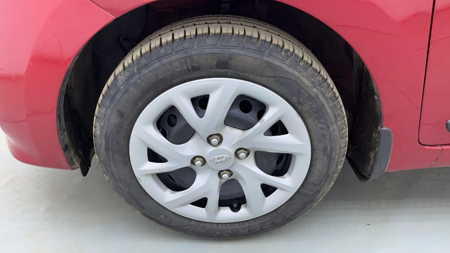 Used 2019 Hyundai Grand i10 Sportz 1.2 Kappa VTVT Petrol Manual tyres LEFT FRONT TYRE RIM VIEW