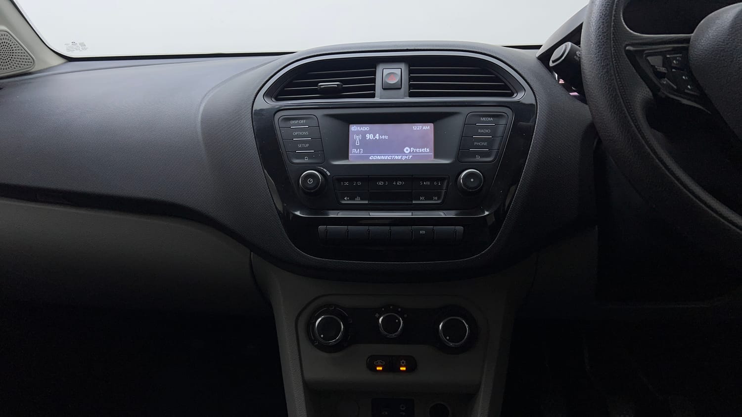Used 2019 Tata Tiago Revotron XZ w/o Alloy Petrol Manual top_features Integrated (in-dash) music system
