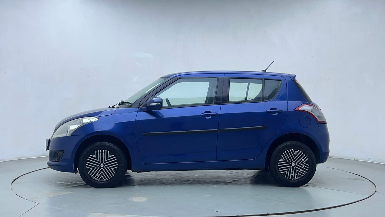 Used 2012 Maruti Suzuki Swift VXi Petrol Manual exterior LEFT SIDE VIEW