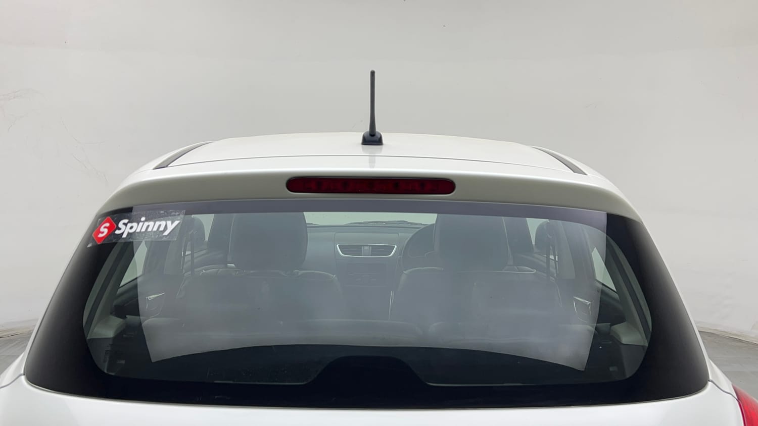 Used 2015 Maruti Suzuki Swift Lxi (O) Petrol Manual exterior BACK WINDSHIELD VIEW