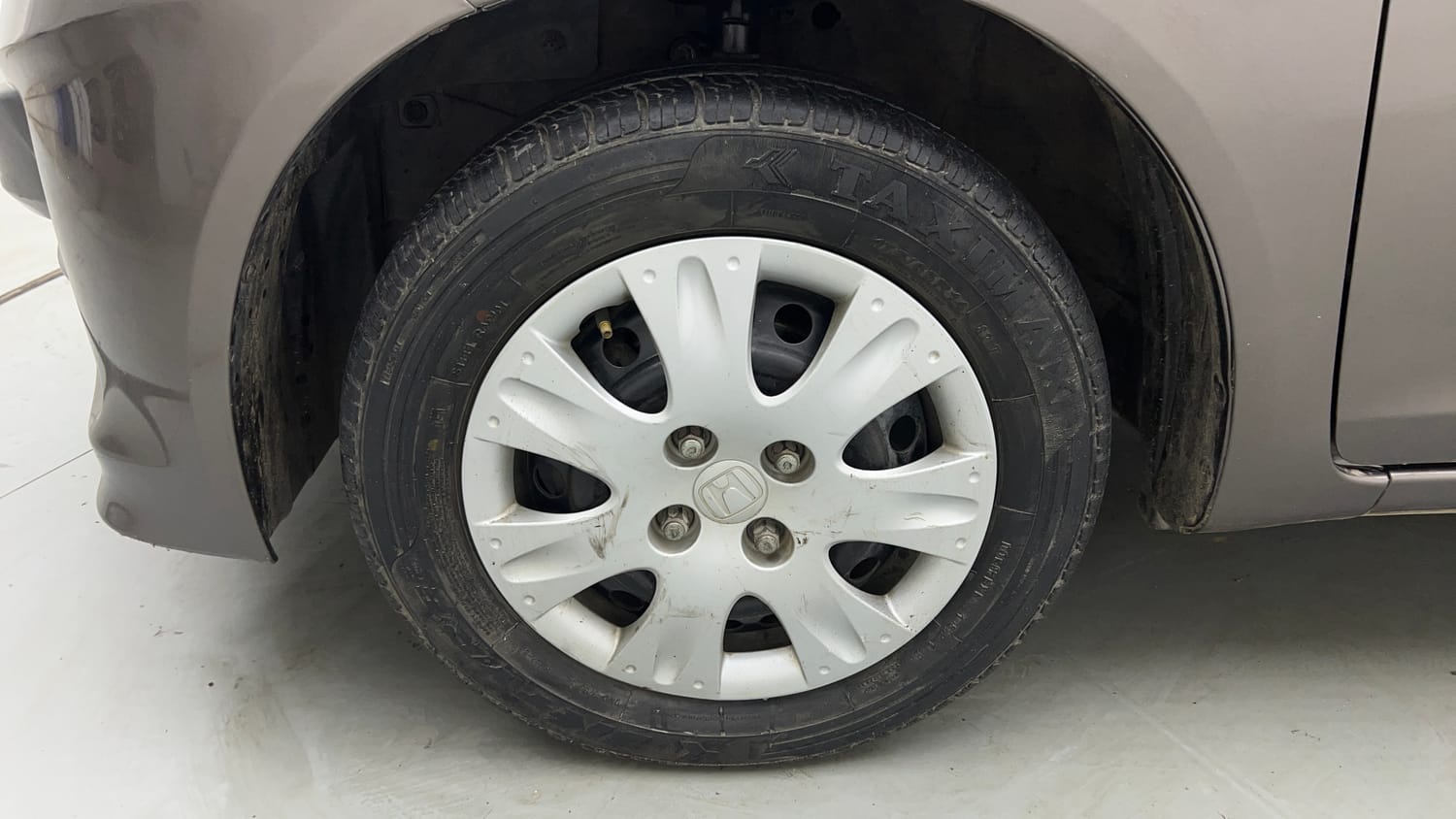 Used 2015 Honda Brio S MT Petrol Manual tyres LEFT FRONT TYRE RIM VIEW