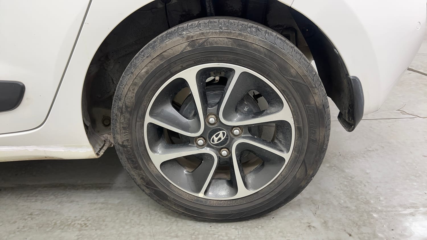 Used 2017 Hyundai Grand i10 Asta 1.2 Kappa VTVT Petrol Manual tyres LEFT REAR TYRE RIM VIEW