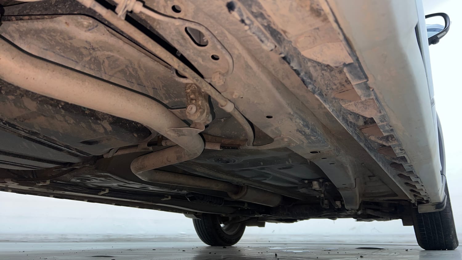 Used 2022 Maruti Suzuki XL6 Alpha Plus MT Petrol Petrol Manual extra REAR RIGHT UNDERBODY VIEW
