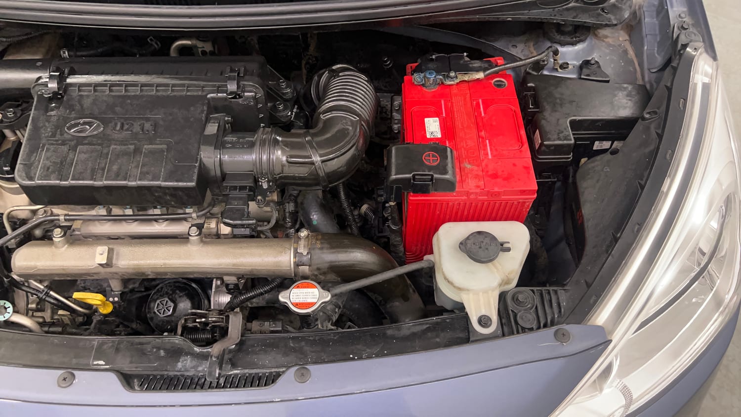 Used 2014 Hyundai Grand i10 Sportz 1.1 CRDi Diesel Manual engine ENGINE LEFT SIDE VIEW