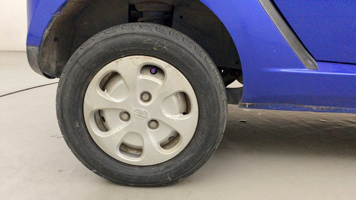 Used 2014 Tata Nano LX Petrol Manual tyres RIGHT REAR TYRE RIM VIEW
