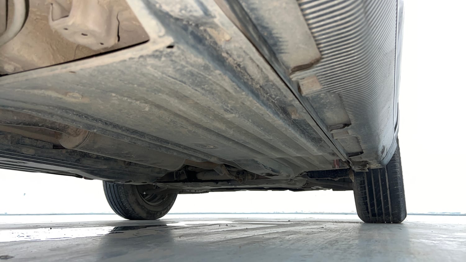 Used 2023 Maruti Suzuki Brezza VXi Petrol Manual extra REAR RIGHT UNDERBODY VIEW