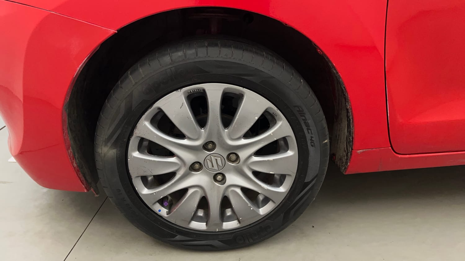Used 2017 Maruti Suzuki Baleno Zeta 1.2 Petrol Manual tyres LEFT FRONT TYRE RIM VIEW