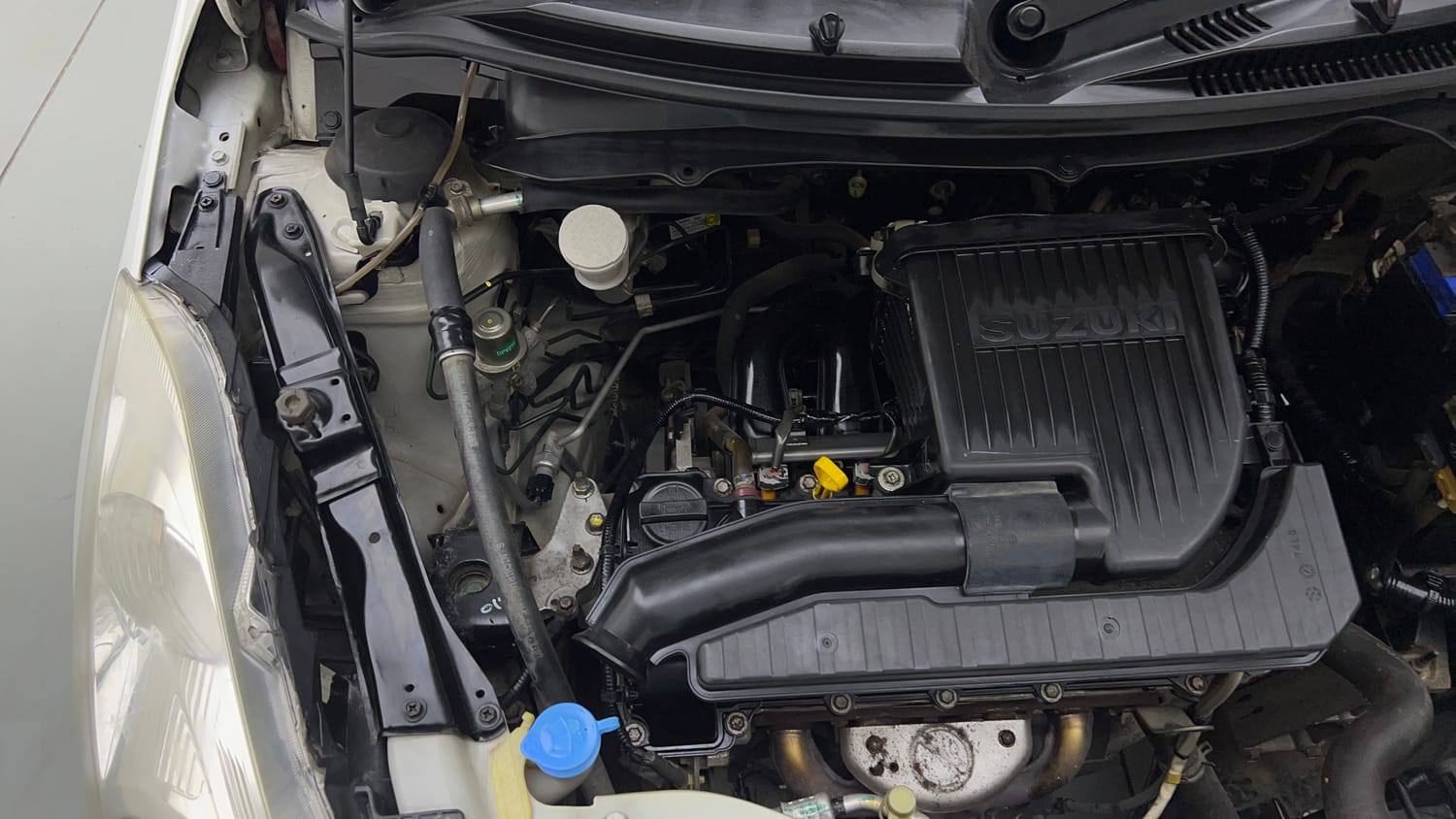 Used 2015 Maruti Suzuki Swift Lxi (O) Petrol Manual engine ENGINE RIGHT SIDE VIEW