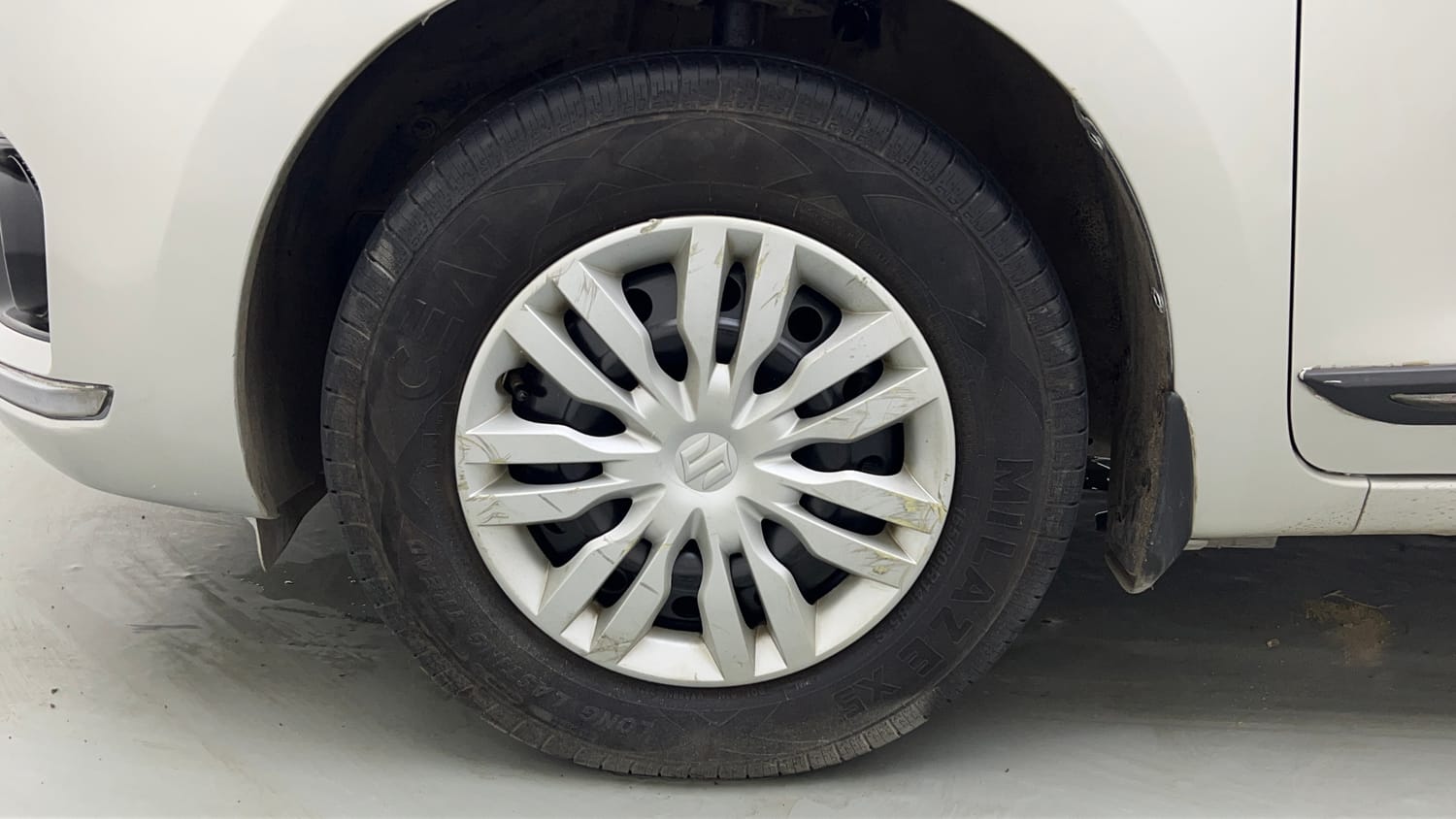 Used 2019 Maruti Suzuki Dzire VXi Petrol Manual tyres LEFT FRONT TYRE RIM VIEW