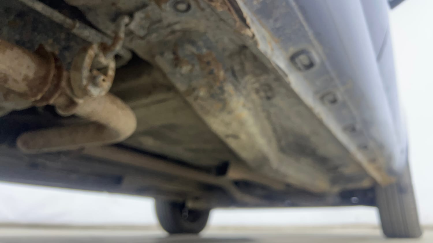 Used 2016 Tata Zest XMS Petrol Petrol Manual extra REAR RIGHT UNDERBODY VIEW
