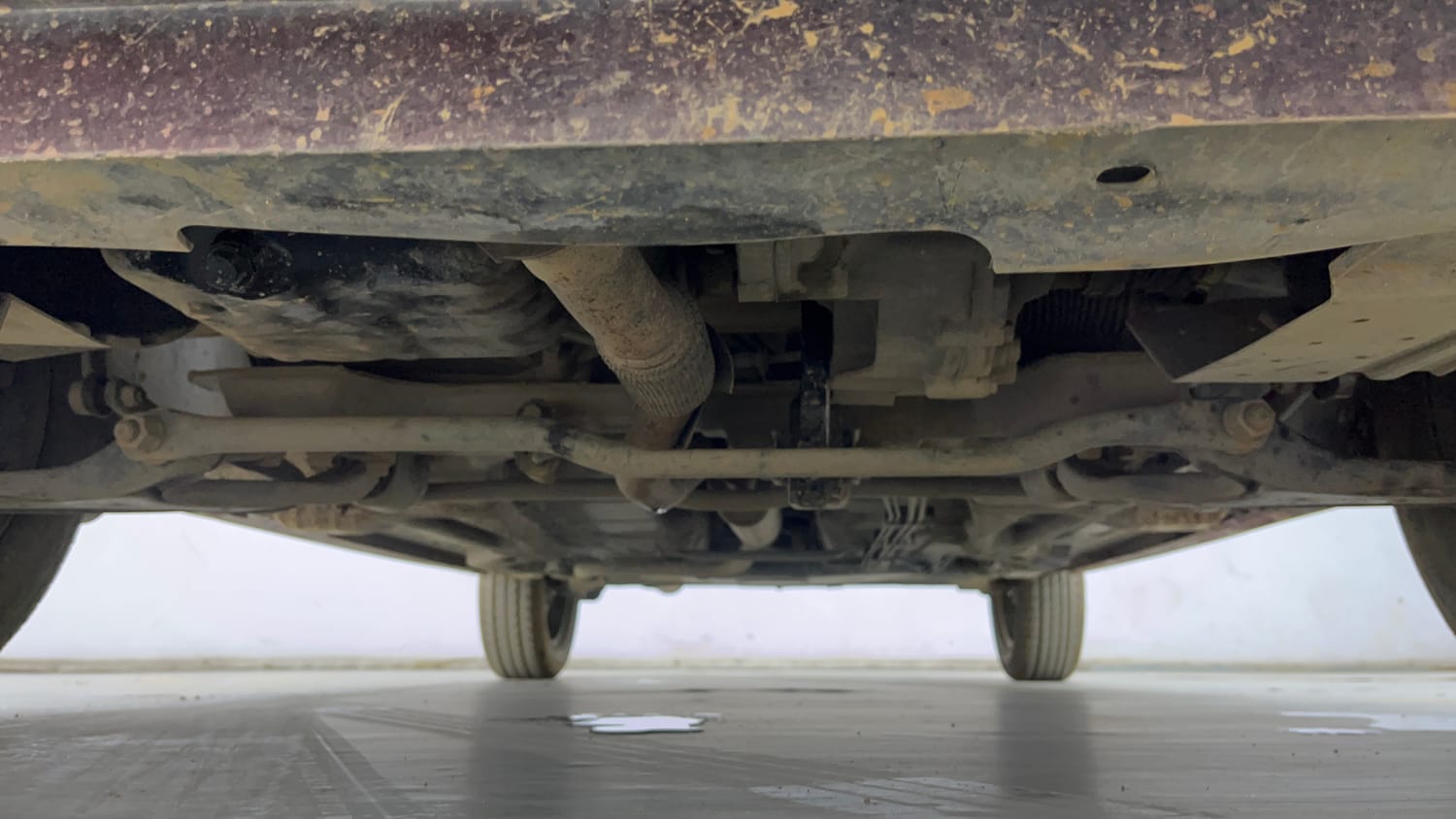 Used 2018 Tata Tiago Revotron XT Petrol Manual extra FRONT LEFT UNDERBODY VIEW
