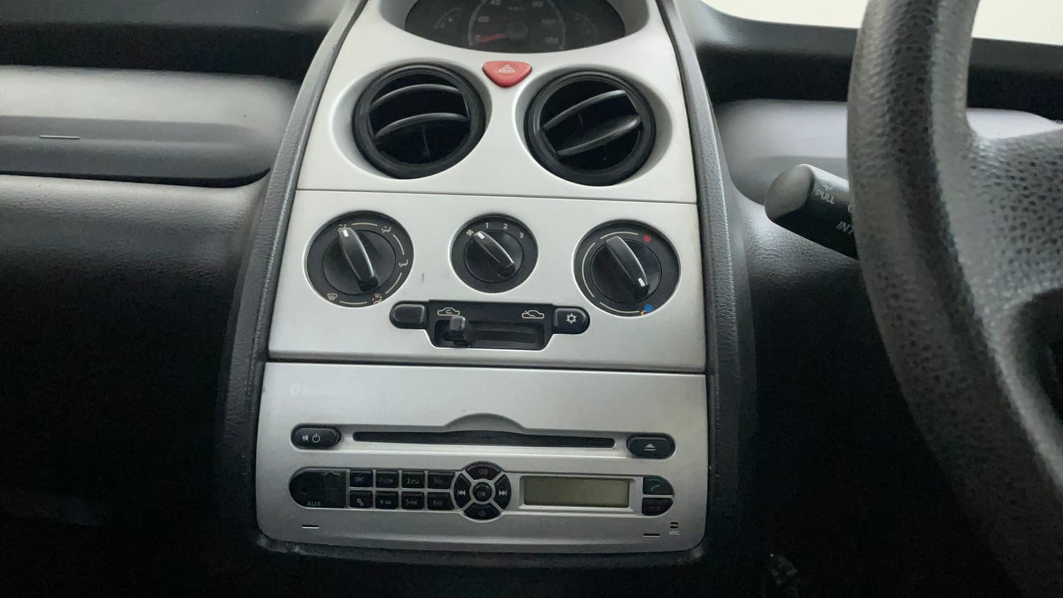 Used 2015 Tata Nano Twist XT Petrol Manual top_features Integrated (in-dash) music system